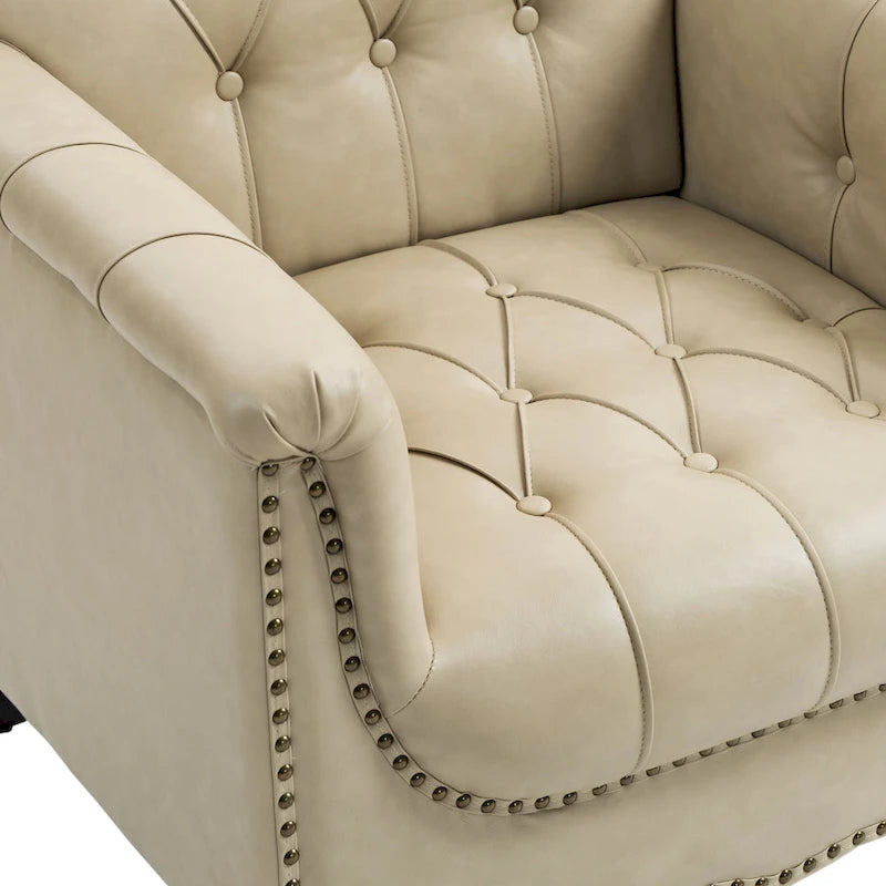 Sessel aus PU-Leder mit Knopfheftung und Nagelbesatz