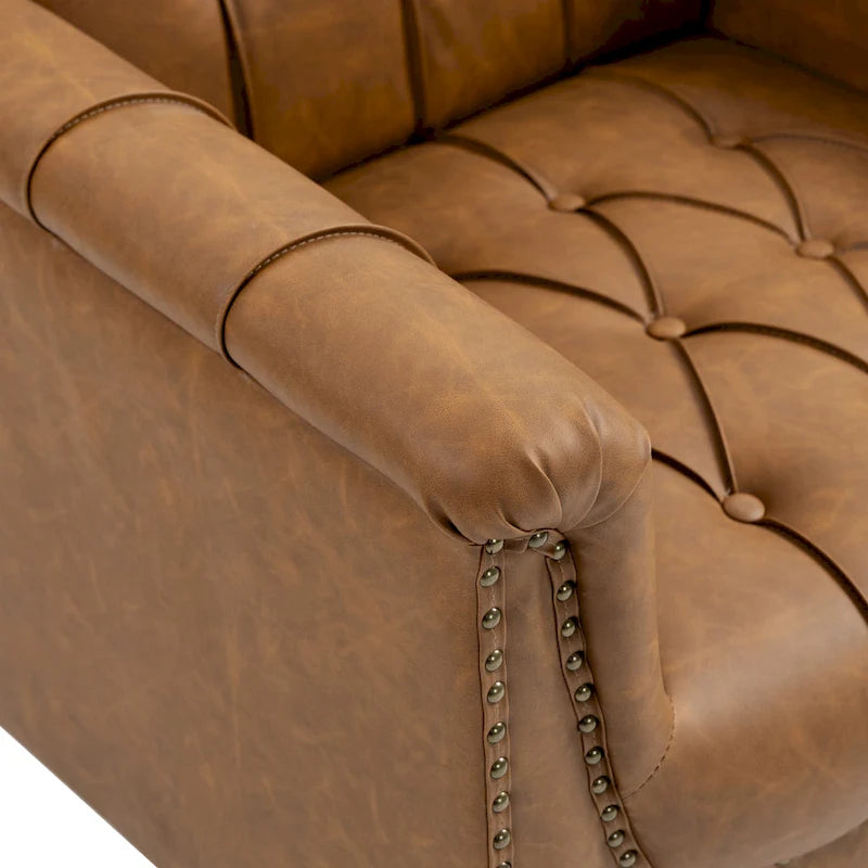 Sessel aus PU-Leder mit Knopfheftung und Nagelbesatz
