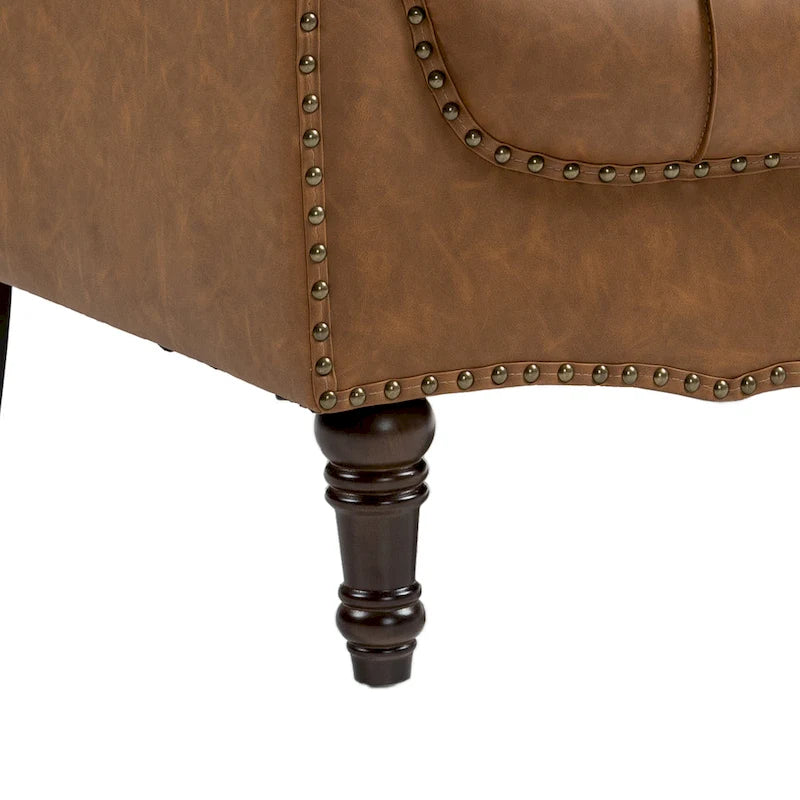 Sessel aus PU-Leder mit Knopfheftung und Nagelbesatz