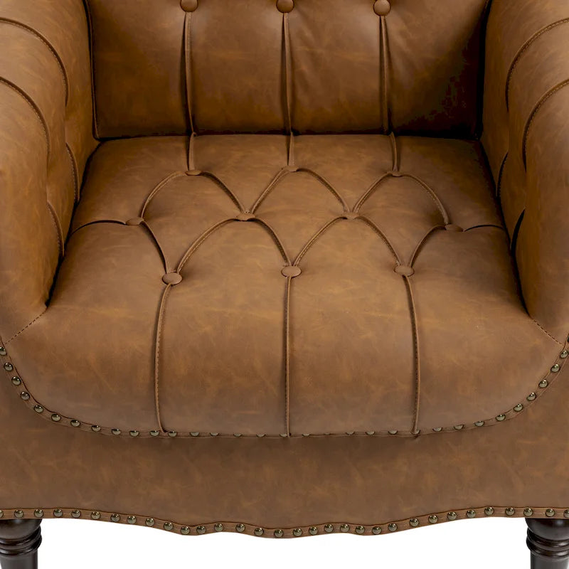 Sessel aus PU-Leder mit Knopfheftung und Nagelbesatz