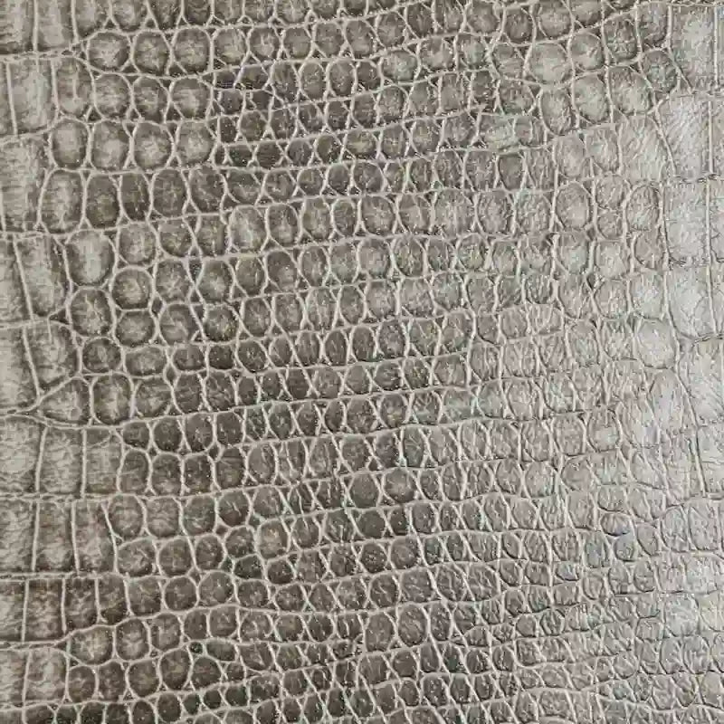Lounge-Sessel aus Kunstleder mit Metallrahmen, grauem Schlangenmuster